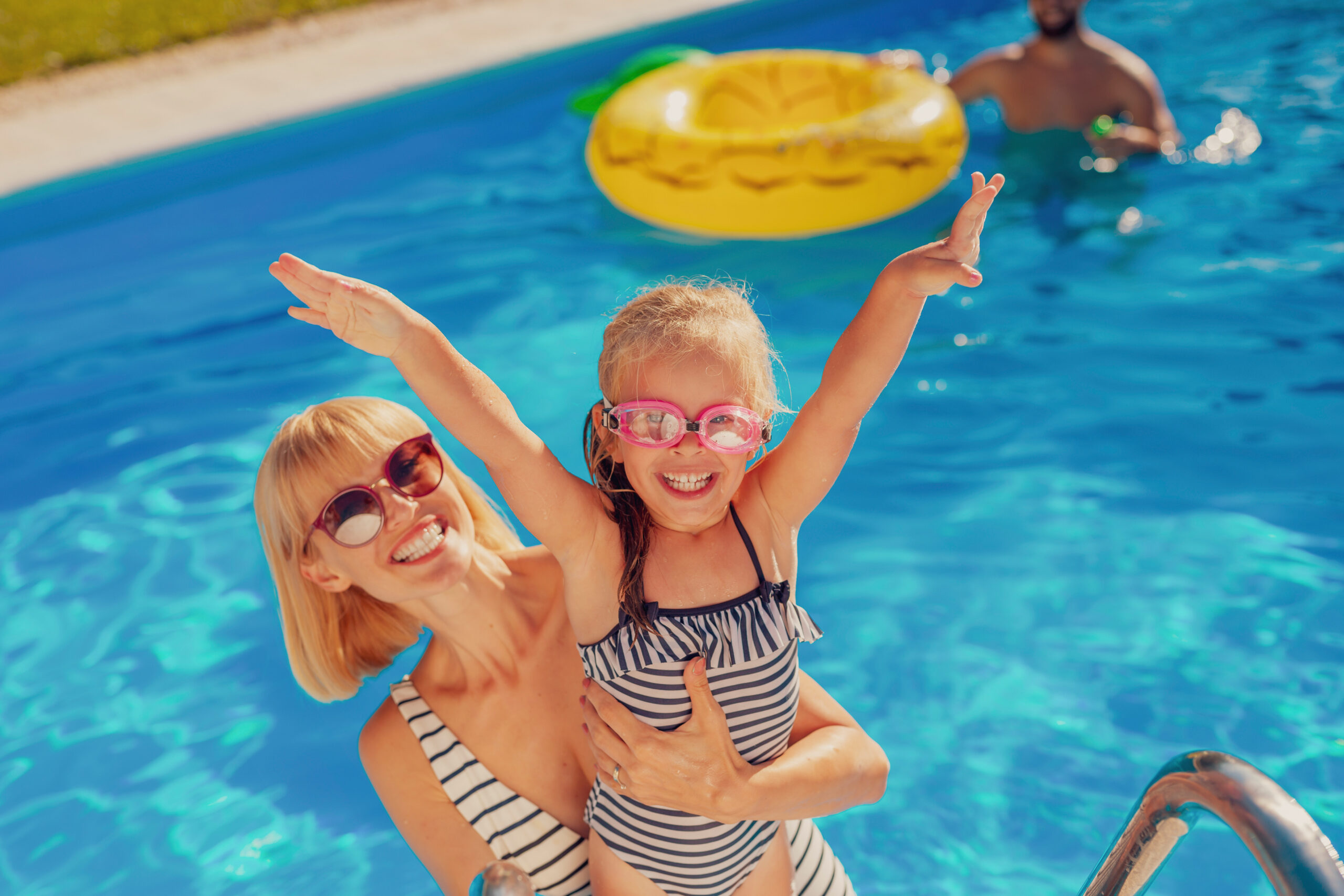 mother and daughter in pool scaled